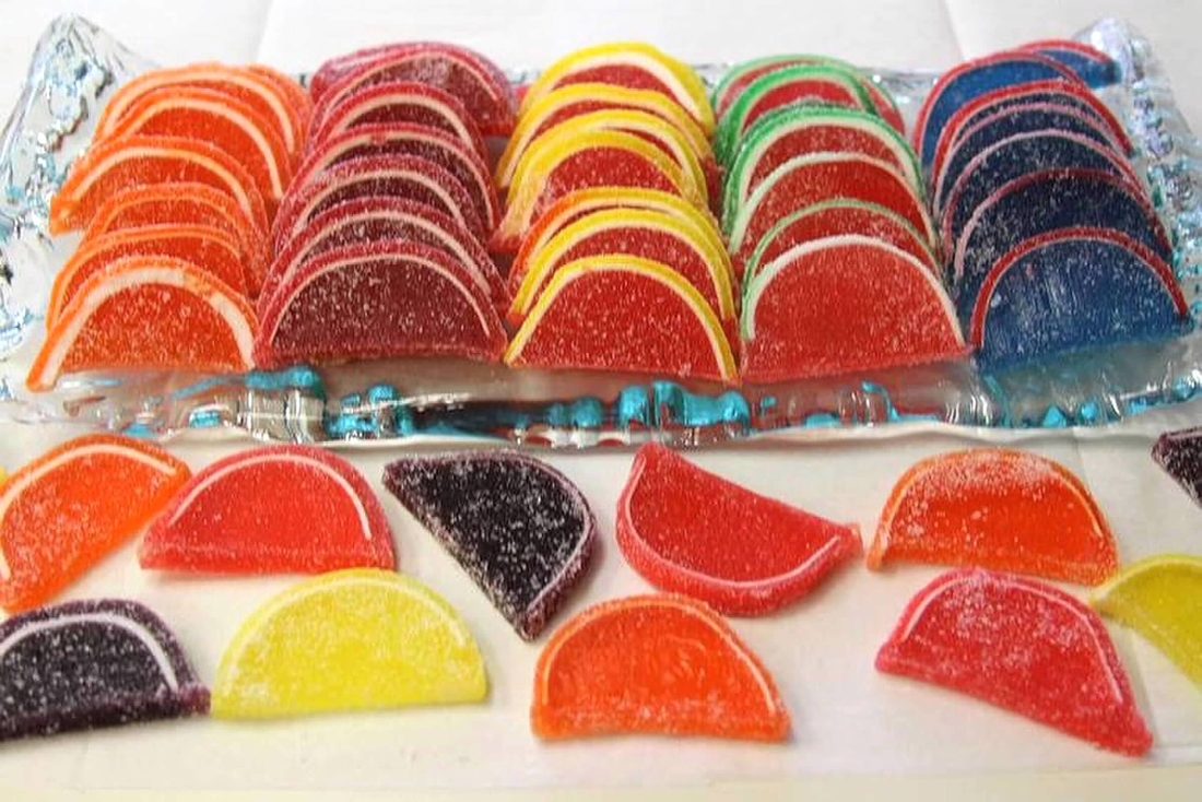 Sugar-dusted jelly fruit slices in raspberry, orange, lemon, lime, and blue raspberry