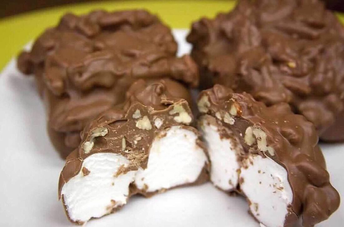 Heavenly Hash — marshmallow and pecans covered in milk chocolate, one cut open to show the marshmallow center